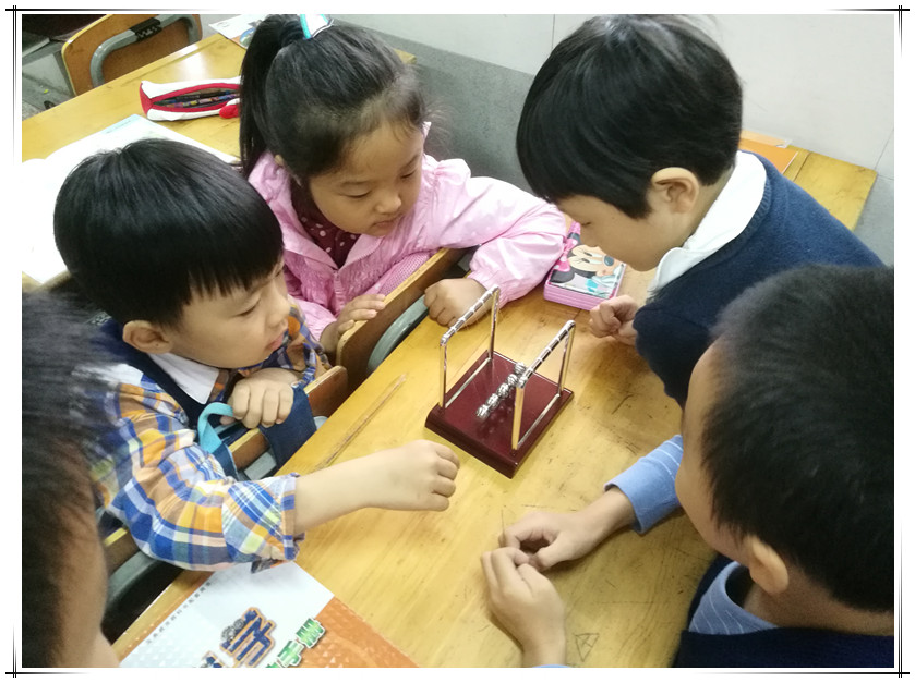 E:\教研组\2017-2018第一学期科学教研组材料\朱乐老师上申报课\学生2_副本.jpg